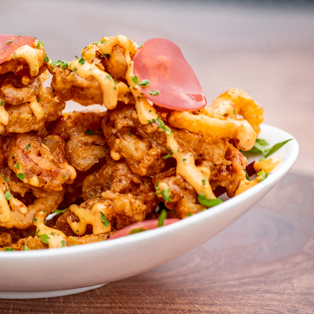 Crispy calamari in cocoa beer batter at The Conche